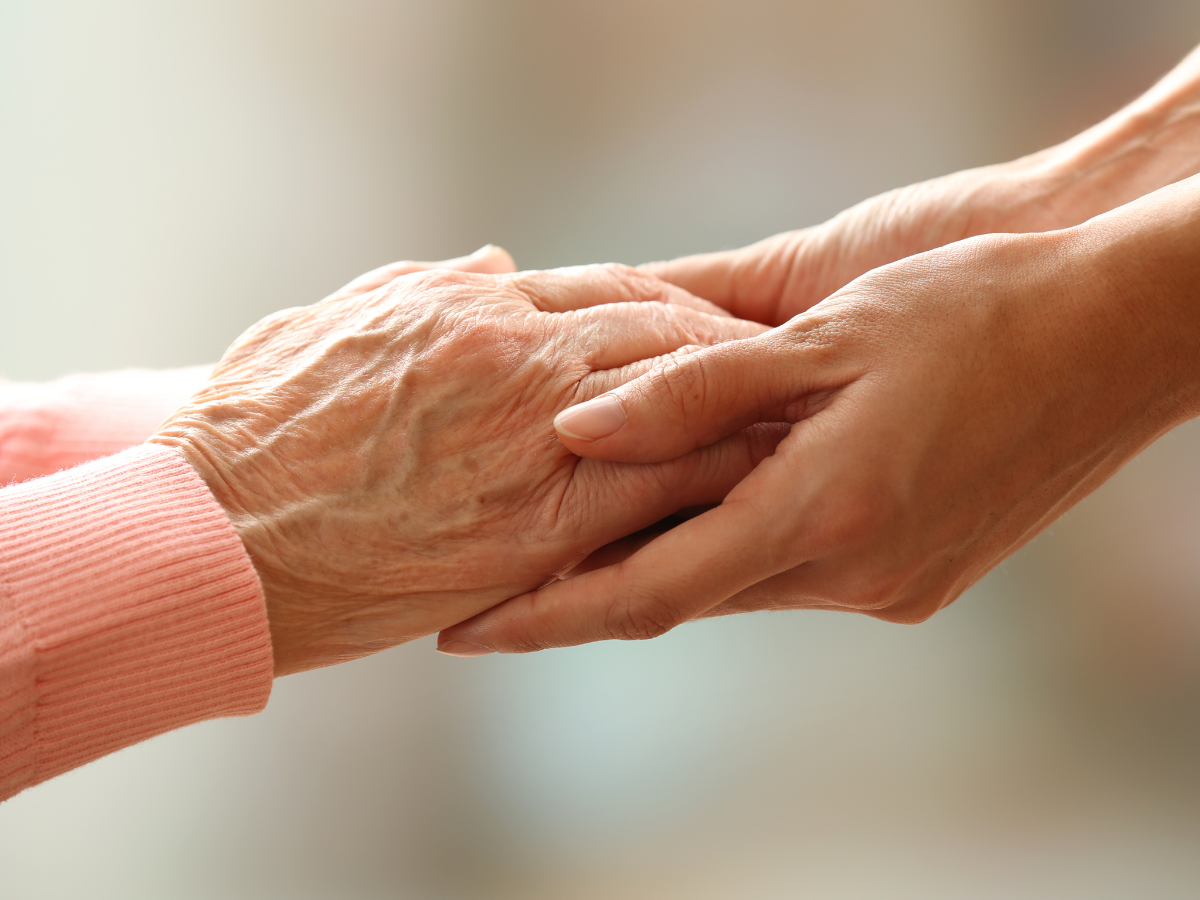 celebration of life hand holding
